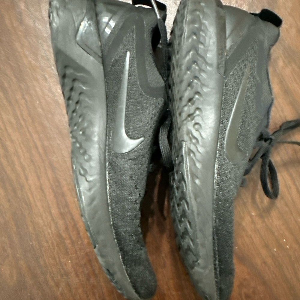Nike Odyssey Women’s Triple Black Knit Lace-Up Sneakers